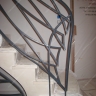 Média réf. 337 (2/2): Rampe d'escalier en fer forgé, style Art nouveau, modèle poissons