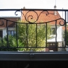 Média réf. 702 (1/4): Appuis de fenêtre en fer forgé, style divers, modèle Barreaux volutes