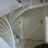 Média réf. 254 (1/5): Rampe d'escalier en fer forgé, style Art décoratif, modèle soleil