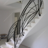 Média réf. 277 (7/8): Rampe d'escalier en fer forgé, style Art décoratif, modèle soleil croisé