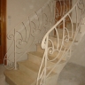 Média réf. 281 (1/2): Rampe d'escalier en fer forgé, style Art décoratif, modèle soleil escargot
