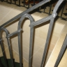 Média réf. 459 (7/8): Rampe d'escalier en fer forgé, style Moyen-âge, modèle romane