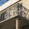 Média réf. 527 (1/9): Balcons en fer forgé, style traditionnel, modèle volutes médaillon 1